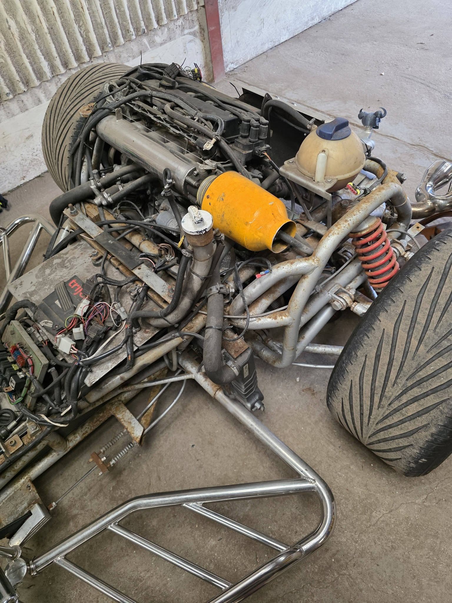 Close-up of engine and rear frame on a custom trike project