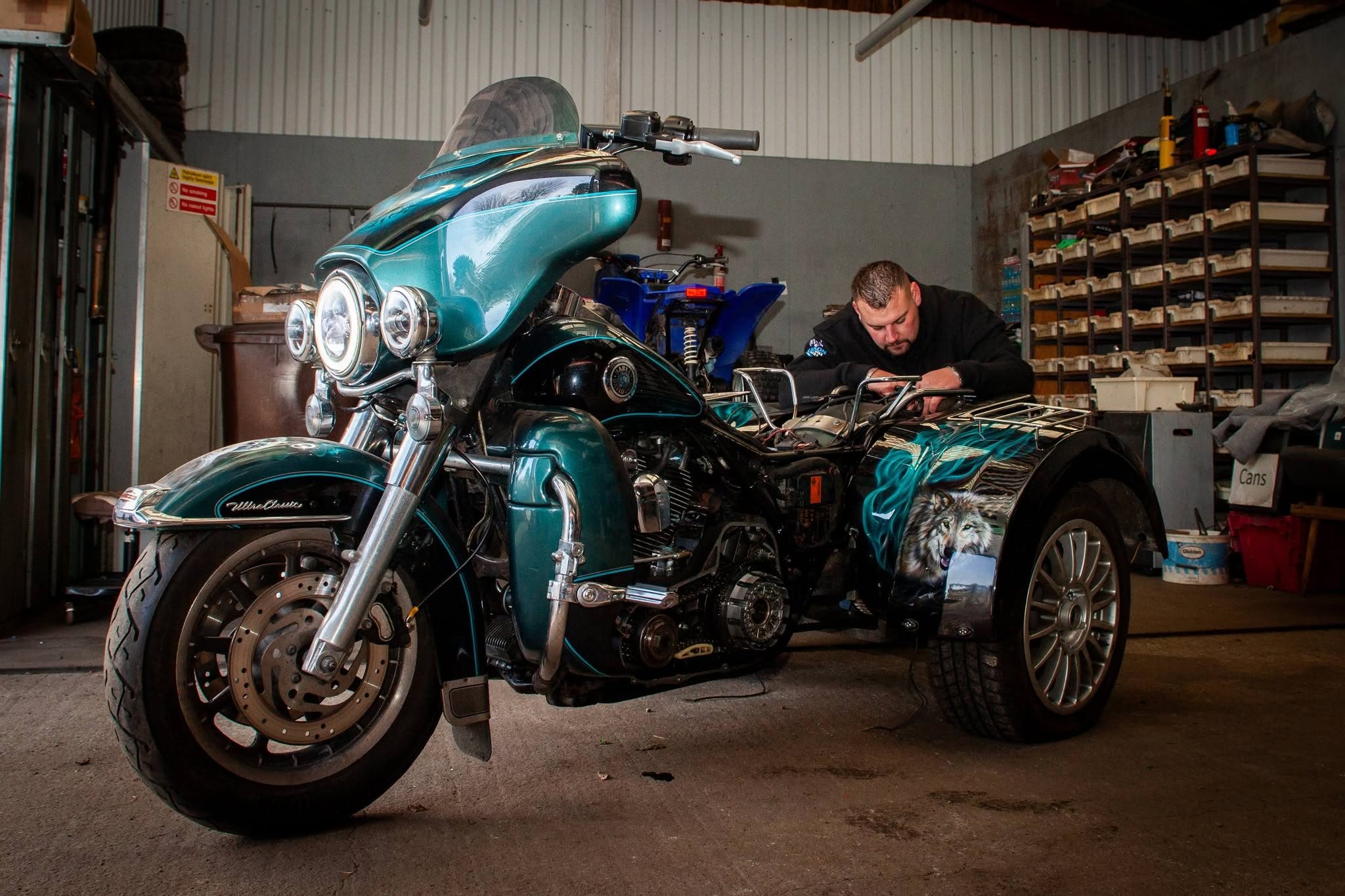 Workshop repair work being carried out on a custom trike